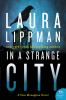 Book cover for "In a strange city".
