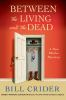 Book cover for "Between the living and the dead".