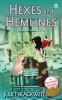 Book cover for "Hexes and hemlines".