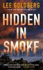 Book cover for "Hidden in smoke".