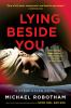 Book cover for "Lying beside you"