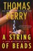 Book cover for "A string of beads".