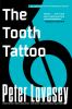 Book cover for "The tooth tattoo".