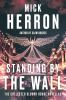 Book cover for "Standing by the wall".