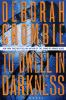 Book cover for "To dwell in darkness".