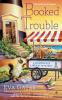 Book cover for "Booked for trouble".